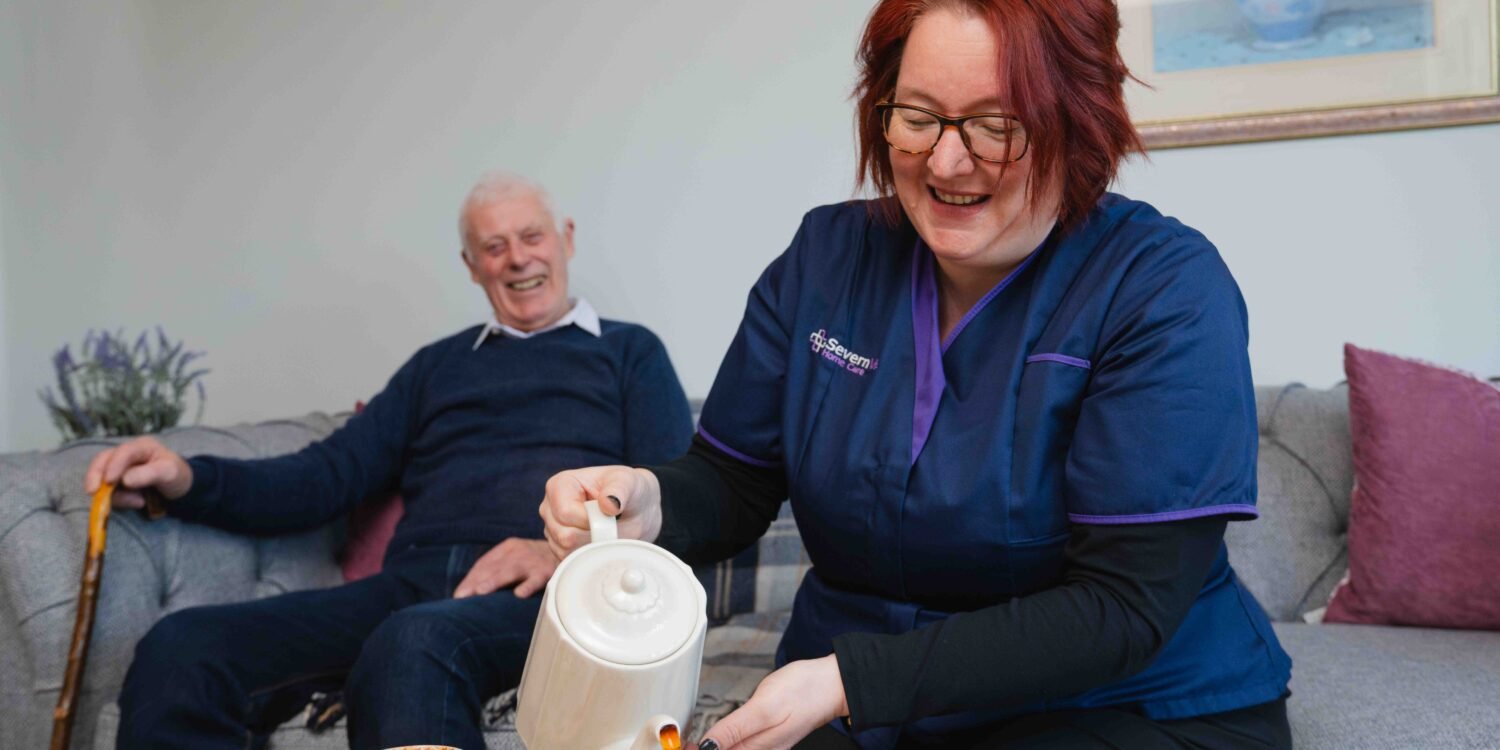 Severn Vale Home Care Carer having tea with patient
