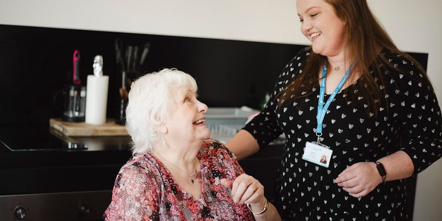 Visiting Angels Cheshire East carer with patient